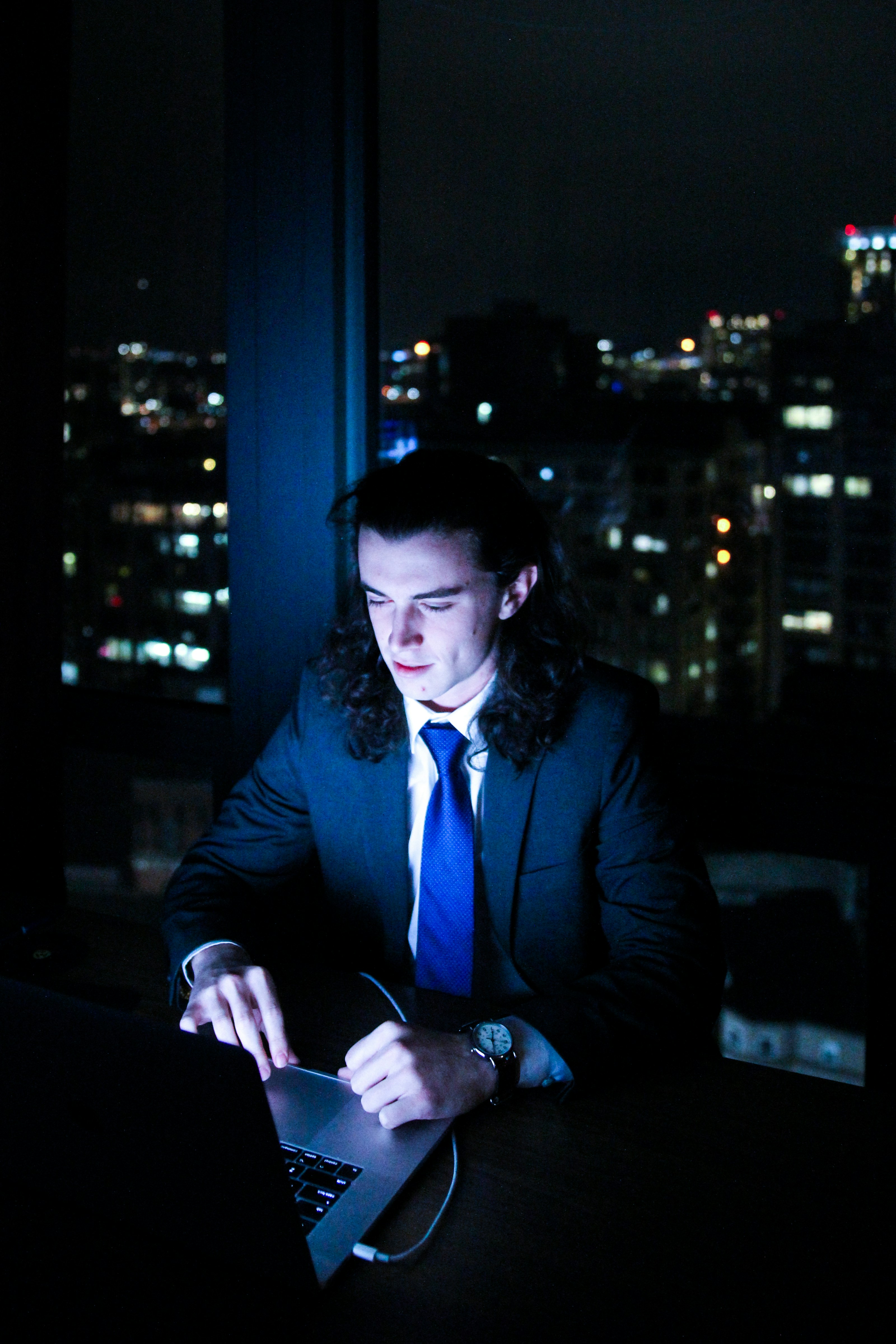 A senior fractional CFO reviewing management accounts and financial reports